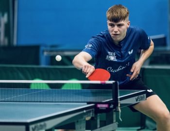 Martin Johnson plays a backhand.